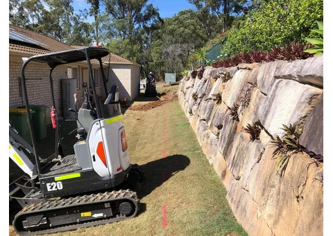 Concrete sleeper retaining wall - Side and back. - Rogers Little Loaders - 2/8