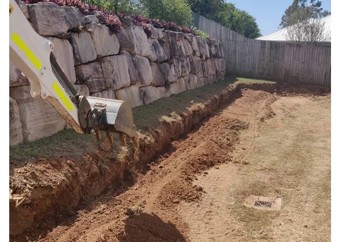 Concrete sleeper retaining wall - Side and back. - Rogers Little Loaders - 4/8