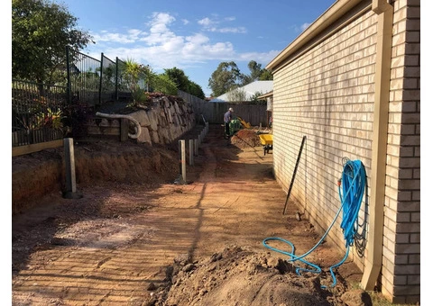 Concrete sleeper retaining wall - Side and back. - Rogers Little Loaders - 5/8