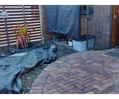 Courtyard paving. - Rogers Little Loaders