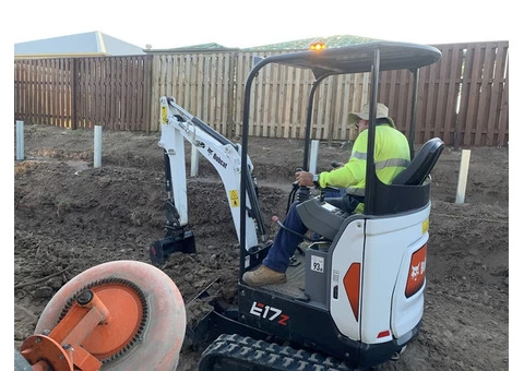 Double tier retaining in Collingwood Park - Rogers Little Loaders - 1/7