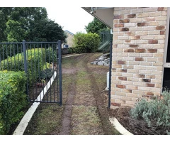 Garden beds, paving strip and full returf. - Rogers Little Loaders