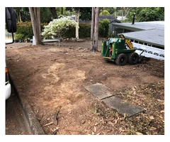 Mulching and turfing on June 14 at Fig Tree Pocket.