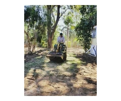 Landscaping using Rogers Little Loaders machinery on June 14 at Nundah, Queensland.