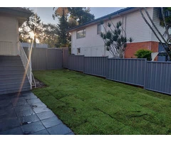 Colour bond fencing with double swinging gates
