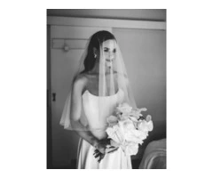 Get a customised wedding dress with a bridal veil