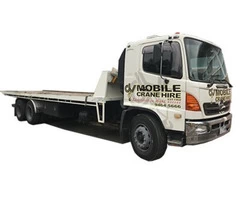 Relocate vehicles and containers with a tilt tray hire