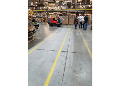 Keep Your Warehouse Spotless with Gateway Services' Floor Sweeping Solutions