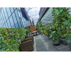 Create a Magical Christmas Atmosphere with Designer Vertical Gardens' Artificial Plants