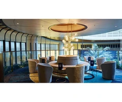 Discover Serenity and Style: The Atrium Bar - Your Oasis of Elegance Amidst Nature's Beauty