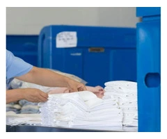 What should I look for when choosing a laundry service provider in Gold Coast?