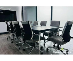 How can office interiors reflect a company’s brand identity?