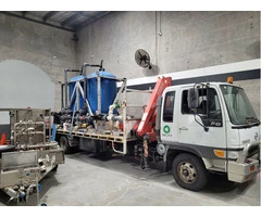 2001 Hino Ranger - Flat bed truck with a HIAB/Fassi 65 crane with filtration system