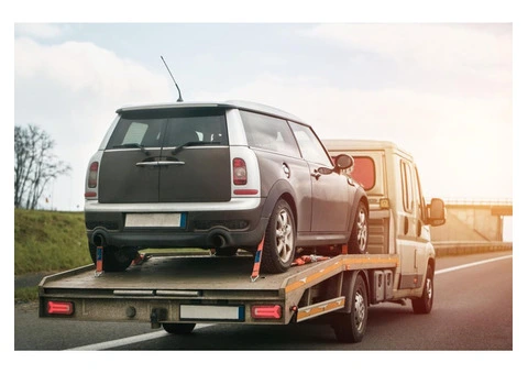 Stuck? Call Caressive—Swift Car Towing Service!
