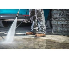 Efficient high-pressure cleaning, sandstone restoration, and graffiti removal services