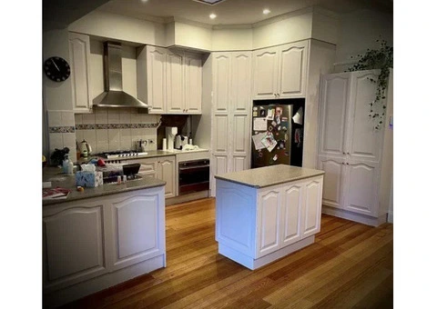 Restore Cabinet Beauty with Precision Kitchen Cabinet Spray Painting