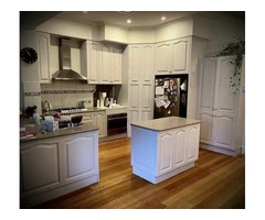 Restore Cabinet Beauty with Precision Kitchen Cabinet Spray Painting
