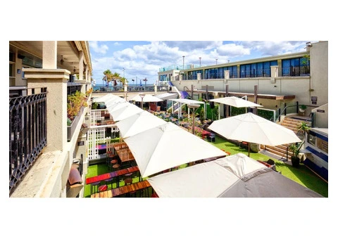 Corporate Umbrellas for Outdoor Areas That Need Reliable Shade