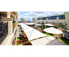 Corporate Umbrellas for Outdoor Areas That Need Reliable Shade