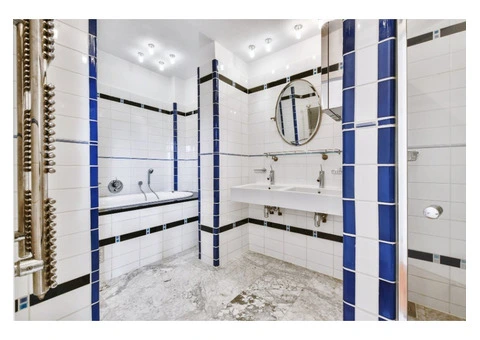 Clean Shower Regrouting Services for Worn Bathroom Tiles