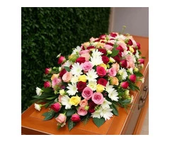 Premium memorial floral sprays delivered across the city