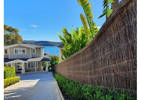Elegant Outdoor Privacy Delivered through Custom brush fencing solutions