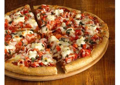 10% off on your first order with Angelo's Traditional Pizza and Ribs - 2/3