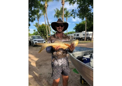 Ollie is having lunch a with Barramundi Fish