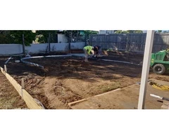 Retaining the entire backyard with geomesh on April 10 - Rogers Little Loaders