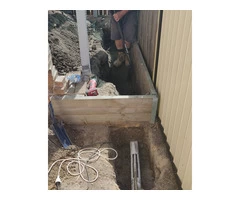 Concrete path and stormwater drainage - Rogers Little Loaders