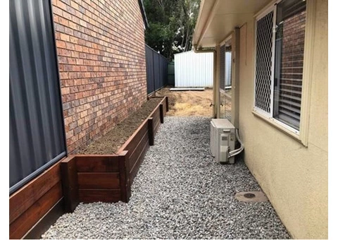 Old fence and retaining wall replacement on April 12 - Rogers Little Loaders. - 1/4