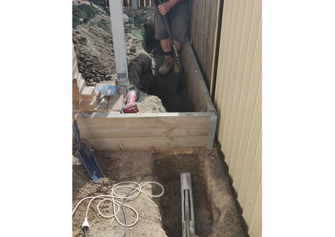 Concrete path and stormwater drainage - Rogers Little Loaders. - 4/7