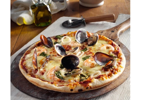 Get Delicious  Pizza’s  5%  0FF  @ Pizza Bite-  Redwood Park - 1/4