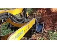 1 hand digging, 1 hand filming.